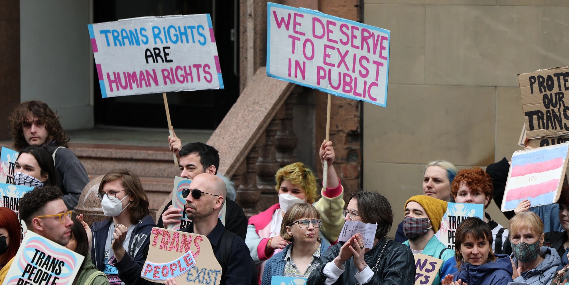 Trans rights demonstrators gather outside the Equalities and Human Rights Commission