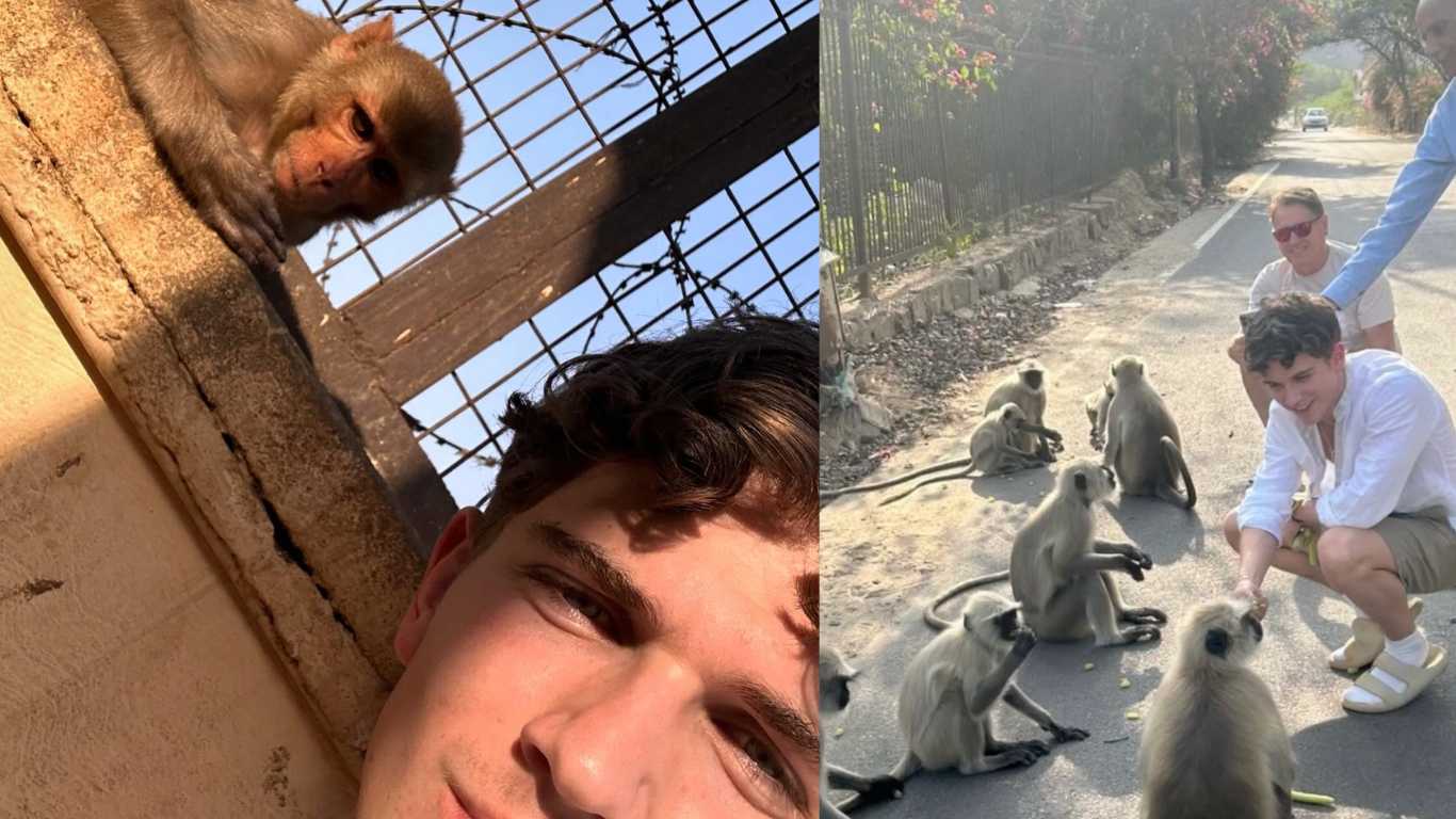 Hollyoaks star Oscar Curtis was hospitalised after being bitten by a monkey in India.