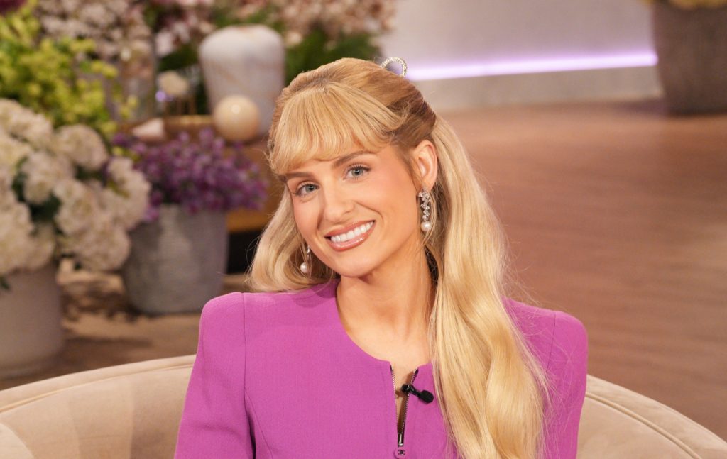 Meghan Trainor in a pink top smiling