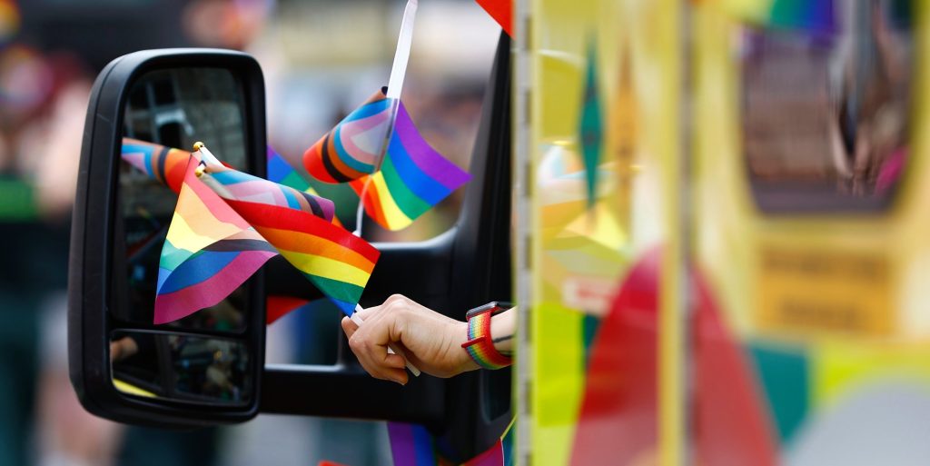 An ambulance seen taking part in a Pride Parade