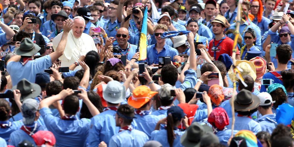 The late Pope Francis meets with members of the Association of Italian Catholic Guides and Scouts (AGESCI) in 2015