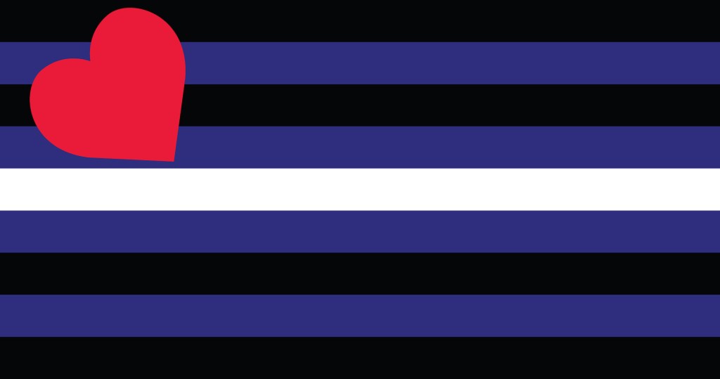 Los colores de cuero de la bandera del Orgullo: negro, azul y blanco con un corazón rojo en la esquina superior izquierda.